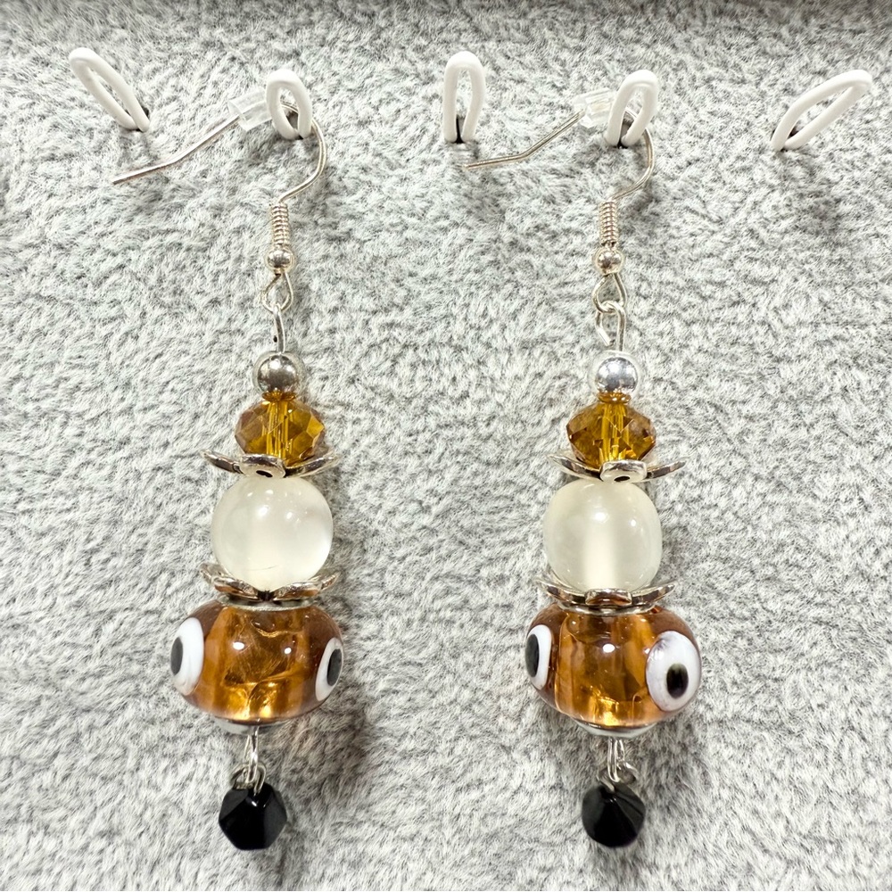 Beaded Dangle Earrings with Eye Design